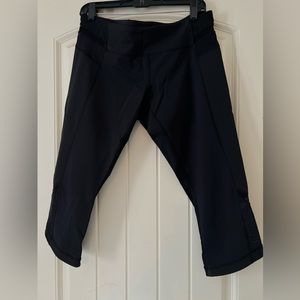 Lululemon Vintage crop in black with mess dot angled legs